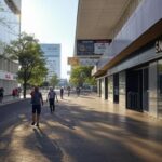 Relatórios e gráficos sobre impactos dos jogos de azar no Distrito Federal, com fundo da arquitetura de Brasília.