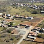 Vista aérea de região urbana em expansão no Brasil, representando aprovação de novas áreas administrativas Ponte Alta e 26 de Setembro