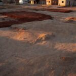 Bairro residencial em Vicente Pires com casas modestas e terrenos, sobre cobranças da Terracap