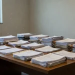 Documentos de auditoria forense em escritório do BRB no caso Banco Master